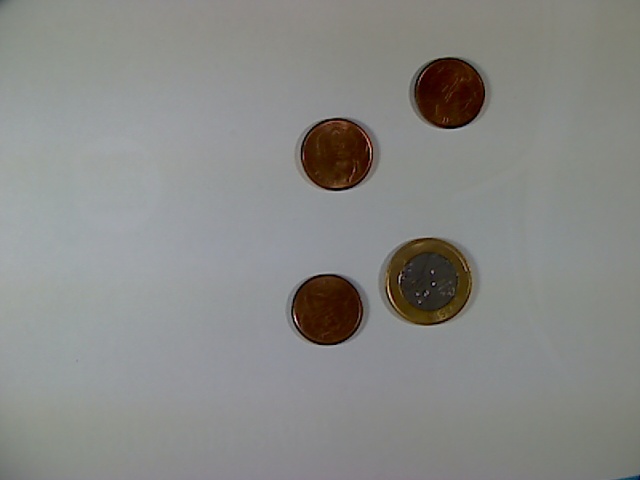 Four Brazilian Real coins from image label 115_1479348288.jpg