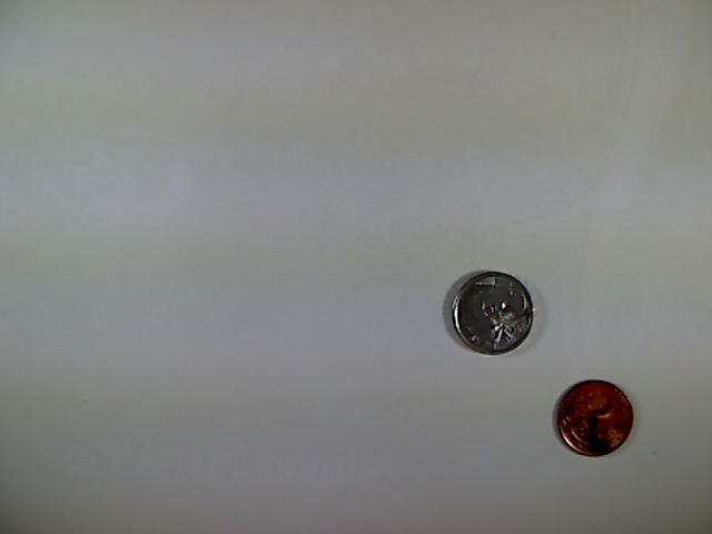 Two Brazilian Real coins from image label 55_1477843506.jpg